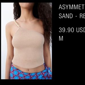 Asymmetric beaded knit top